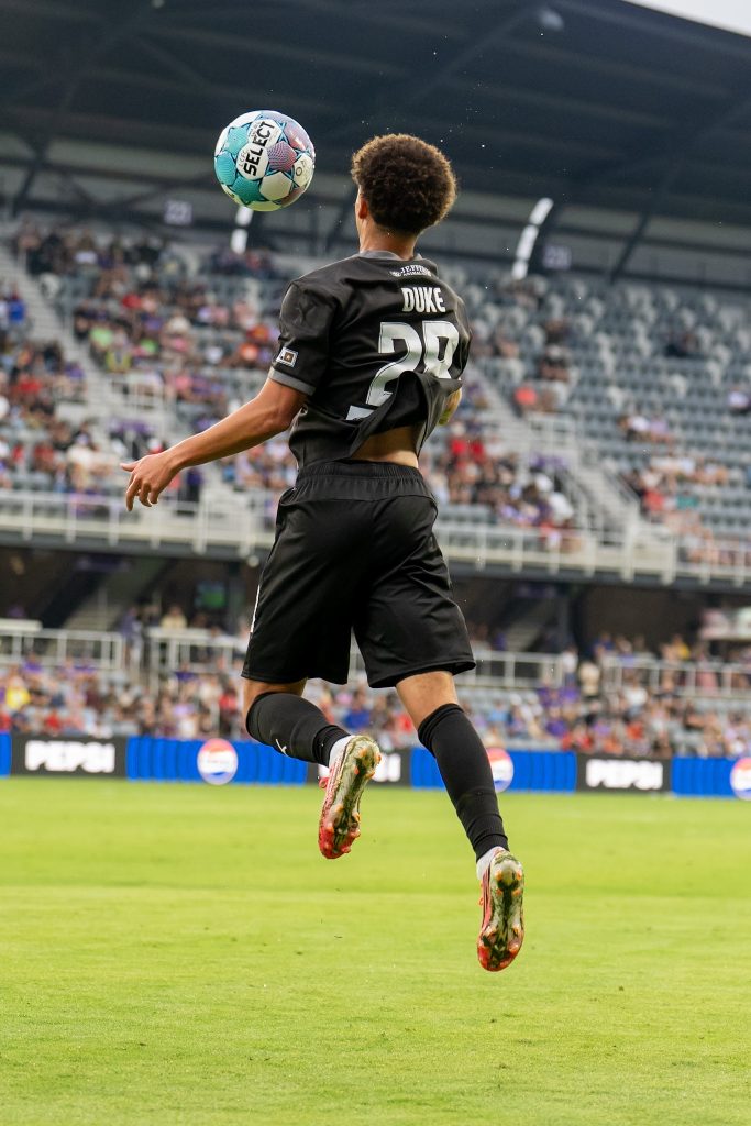 Duke for Louisville City with the airborne control against Trinidad and Tobago