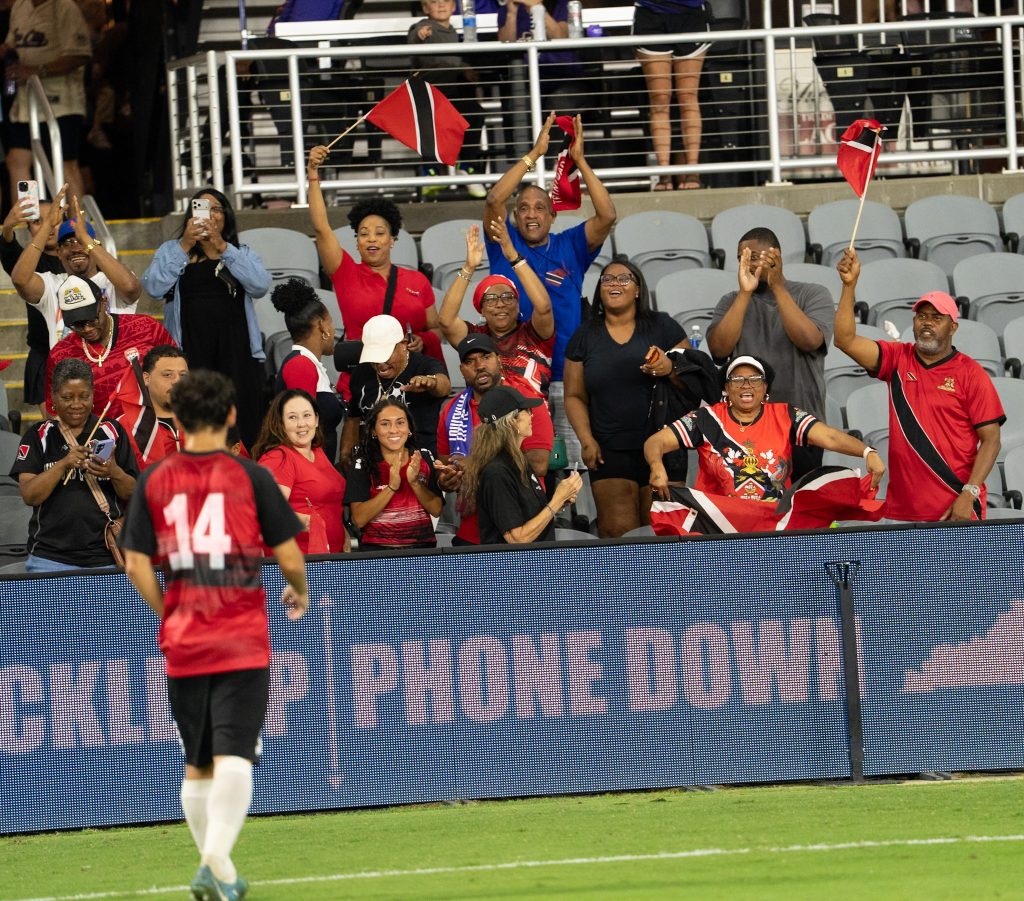 Trinidad and Tobago fans celebrate the opportunity to see their first home team against their second home team Louisville City