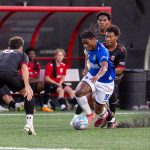 Virginia Marauders and Loudon United FC players battle for possession during USL Two action