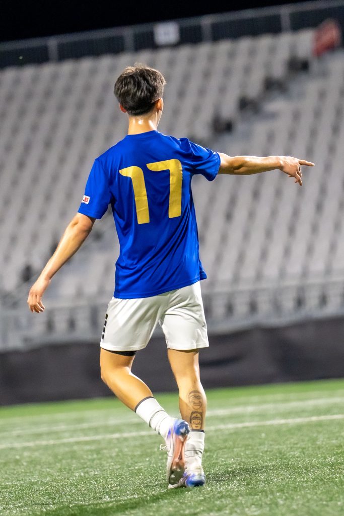 Loudoun United FC 2 defender barks instructions to teammates during USL League Two action against Virginia Marauders.