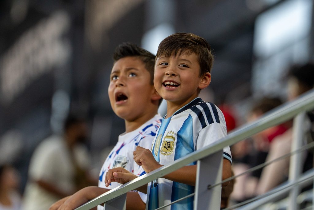 Young DC United fans take part in the celebration