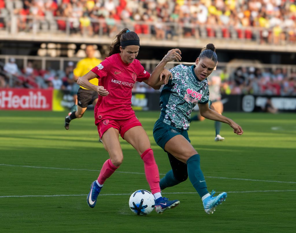 NC Courage try to maintain possession as Washington Spirit player challenges